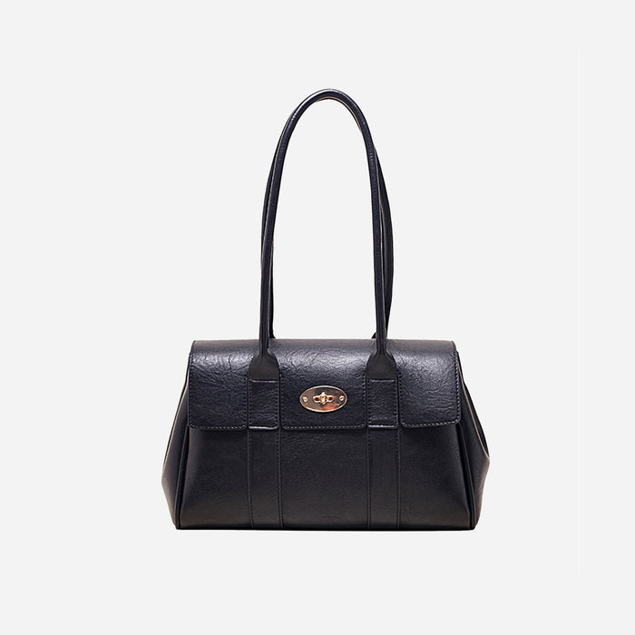 Elegant black leather structured handbag with double top handles and gold turn-lock clasp, perfect for formal or business settings